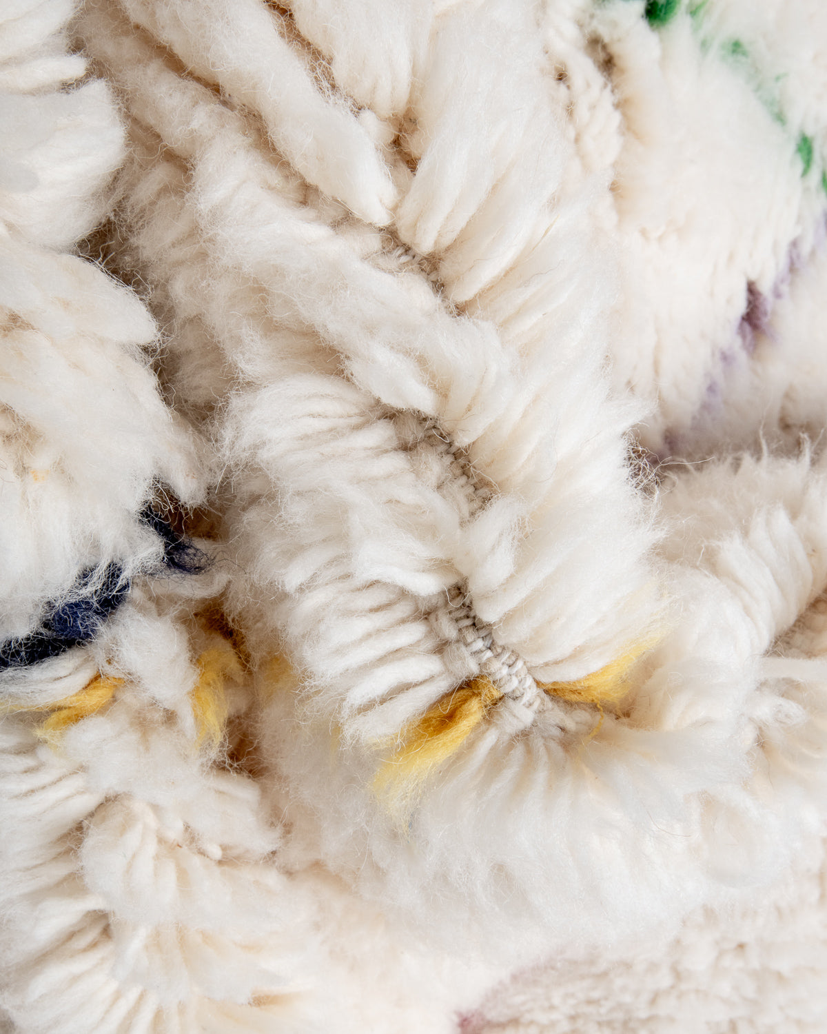 Modern, designer, handcrafted Berber rug from Morocco. Beniourain carpet with beautiful colours and patterns and fluffy wool texture.